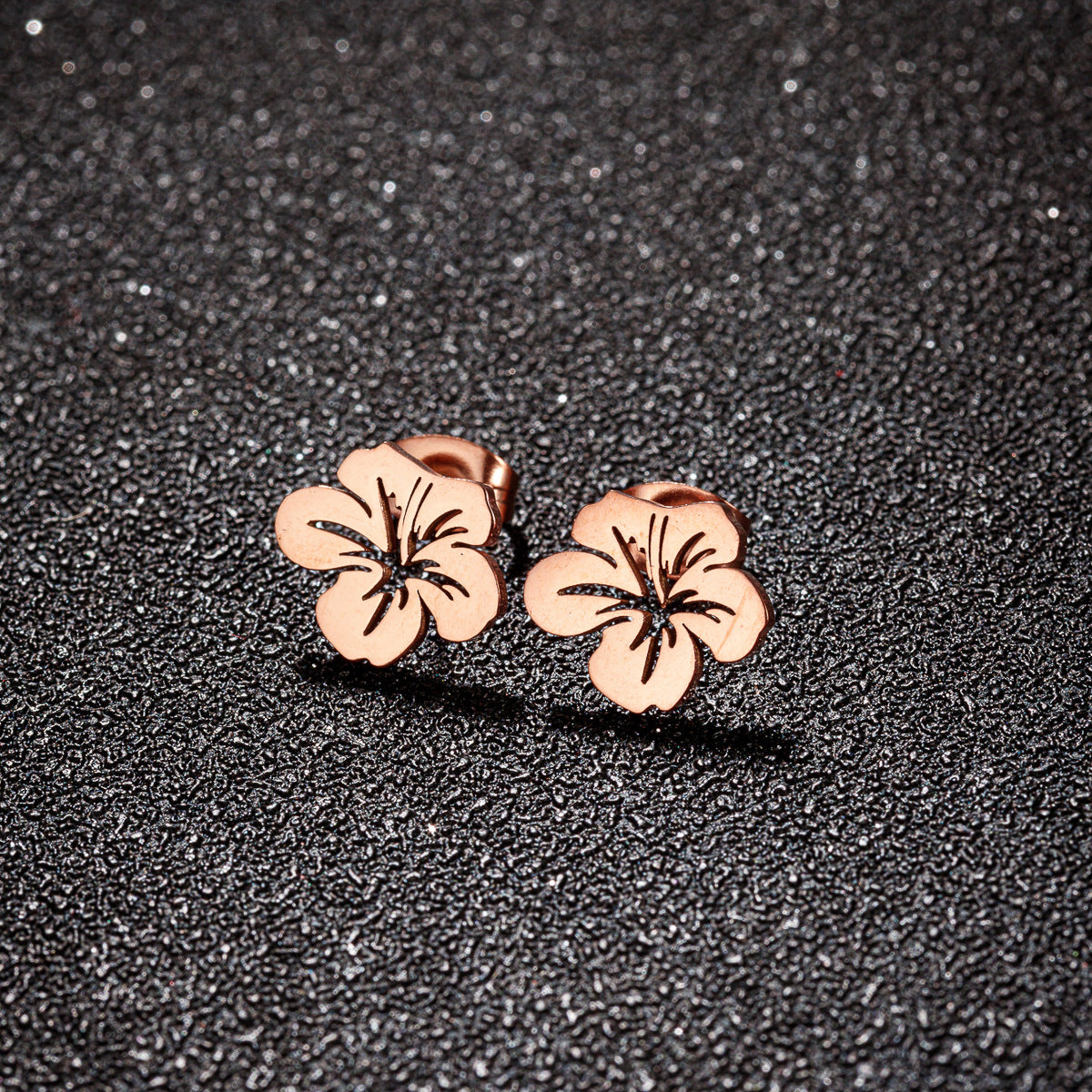 Boucles d'oreilles fleurs ajourées en acier inoxydable - Élégance florale
